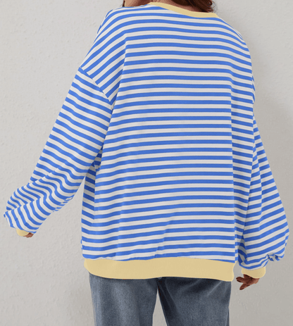 RANDIG LÅNGÄRMAD PULLOVER I OVERSIZED-MODELL FÖR KVINNOR