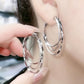 Pendientes de triple aro con diamantes
