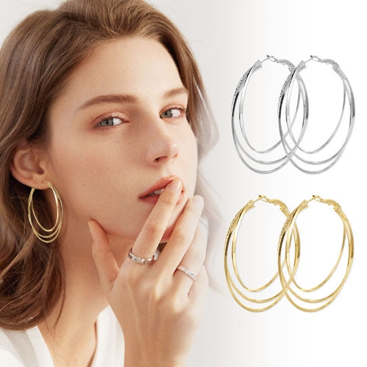 Pendientes de triple aro con diamantes