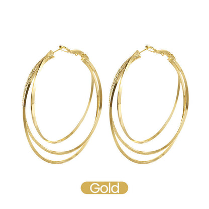 Pendientes de triple aro con diamantes