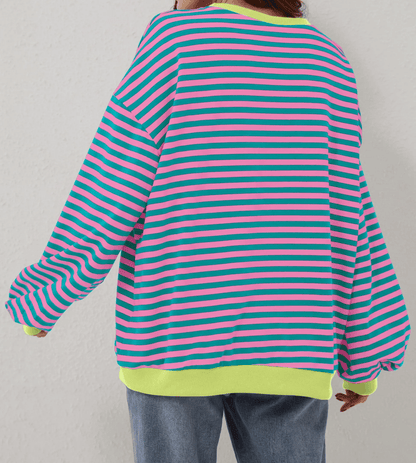 RANDIG LÅNGÄRMAD PULLOVER I OVERSIZED-MODELL FÖR KVINNOR
