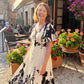 🌺👗 Vestido Midi con Escote V y Estampado Botánico – Moderno y Femenino 💖