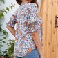 Blusa floral con escote en V y mangas abullonadas para mujer