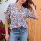 Blusa floral con escote en V y mangas abullonadas para mujer
