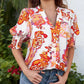Blusa floral con escote en V y mangas abullonadas para mujer