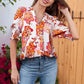 Blusa floral con escote en V y mangas abullonadas para mujer