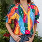 Blusa floral con escote en V y mangas abullonadas para mujer