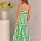 Vestido largo a rayas con bloques de color y tirantes finos.
