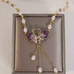 Collar colgante doble cisne morado
