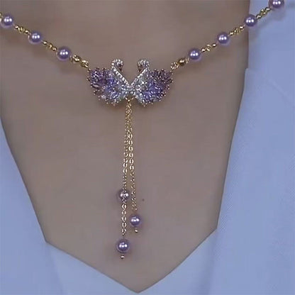 Collar colgante doble cisne morado