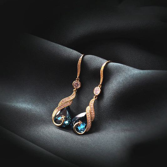 ✨ ¡50 % DE DESCUENTO POR TIEMPO LIMITADO! 🦚 Pendientes Phoenix: diseño de pavo real, piedras de circonita, ligeros, ideales para regalar 🎁