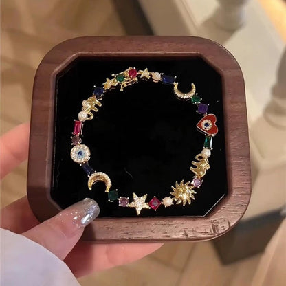🌙 ⭐ ¡Oferta Limitada 50% DESCUENTO! Pulsera Encanto Celeste – Dijes Estrella y Luna con Cristales Multicolor ✨