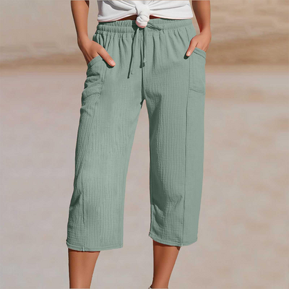 Pantalones cortos plisados de algodón y lino de color liso para mujer