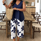 🌸 ¡TIEMPO LIMITADO 50% DE DESCUENTO! ✨ Set de camiseta asimétrica y pantalones capri con estampado floral para mujer – versátil, vibrante, cómodo 🌺
