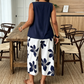 🌸 ¡TIEMPO LIMITADO 50% DE DESCUENTO! ✨ Set de camiseta asimétrica y pantalones capri con estampado floral para mujer – versátil, vibrante, cómodo 🌺