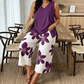 🌸 ¡TIEMPO LIMITADO 50% DE DESCUENTO! ✨ Set de camiseta asimétrica y pantalones capri con estampado floral para mujer – versátil, vibrante, cómodo 🌺