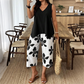 🌸 ¡TIEMPO LIMITADO 50% DE DESCUENTO! ✨ Set de camiseta asimétrica y pantalones capri con estampado floral para mujer – versátil, vibrante, cómodo 🌺