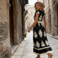 👗¡Nueva llegada con un 60% de descuento!🏖️Vestido largo fluido con estampado barroco y escote en V para mujer