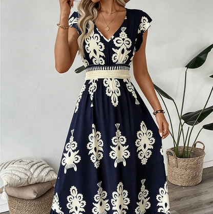 👗¡Nueva llegada con un 60% de descuento!🏖️Vestido largo fluido con estampado barroco y escote en V para mujer