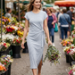 Vestido midi de mujer a rayas con lazo lateral