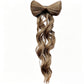 Coleta con lazo para un look glamuroso al instante