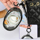 Estuche transparente con llavero